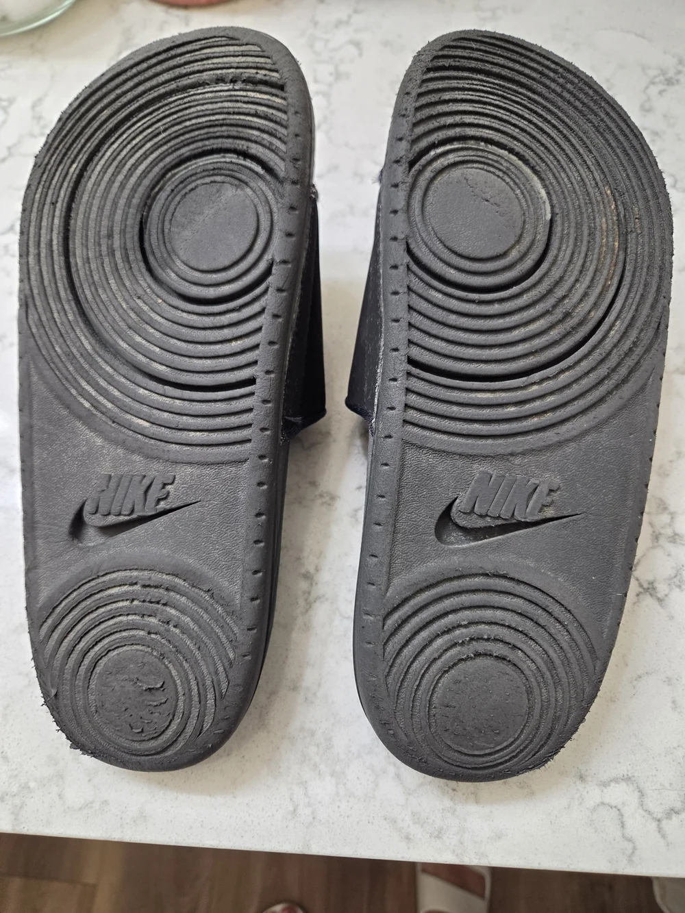 Nike Black Slide Sandals with Embossed Logo Strap